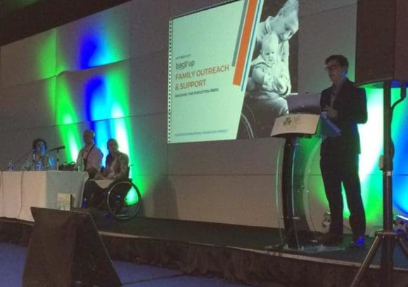 Staff member Andrew speaks at the 56th International Spinal Cord Injury Conference